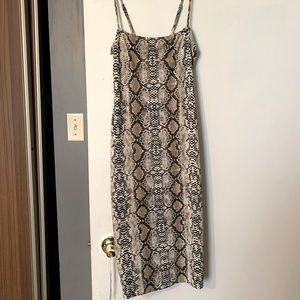 Snakeskin print dress, worn once excellent condition bought at Simons